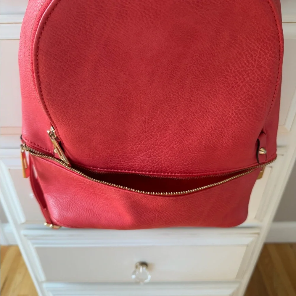 Salmon colored Real Italian leather mini backpack with gold hardware